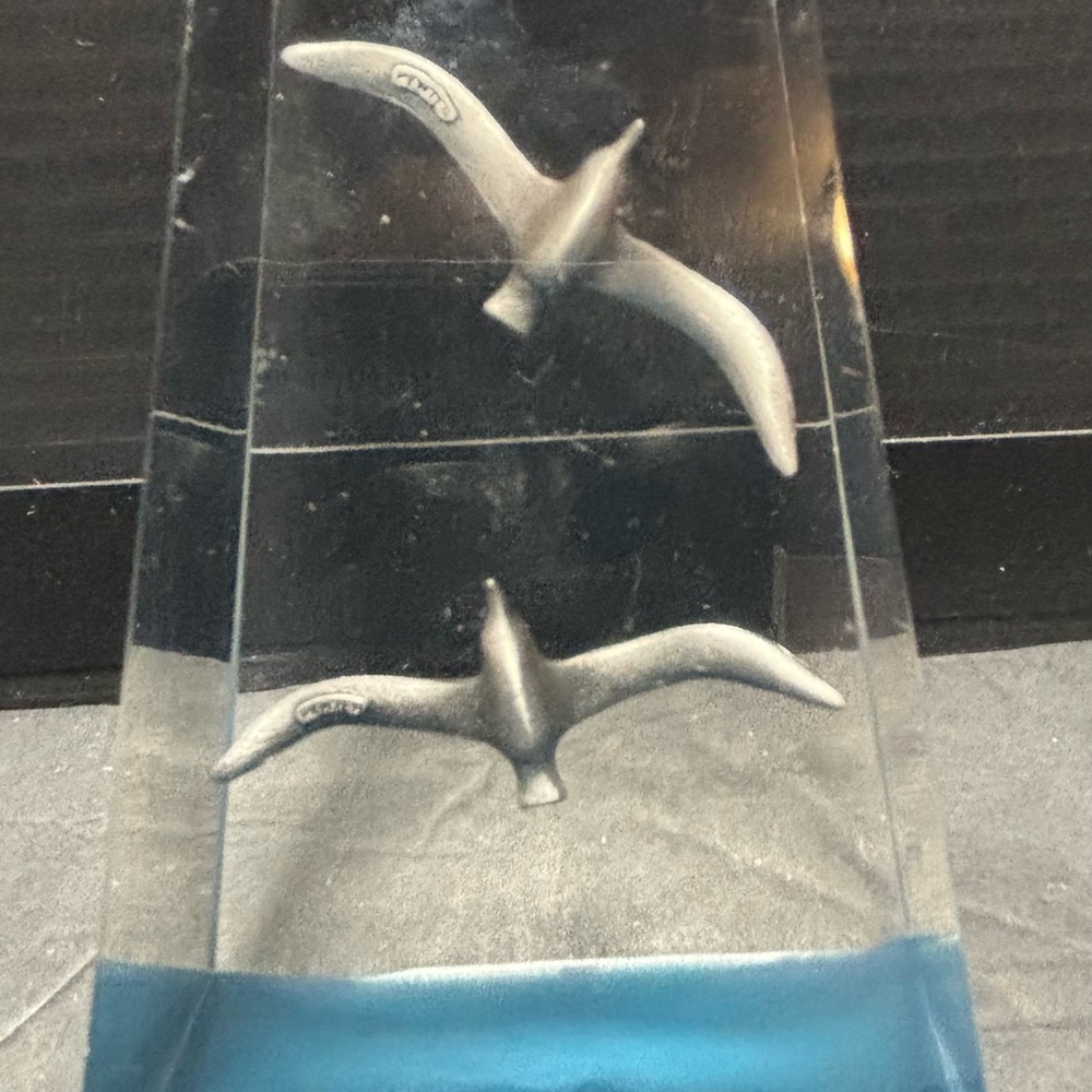 vintage seagull paperweight crafted from clear lucite or acrylic